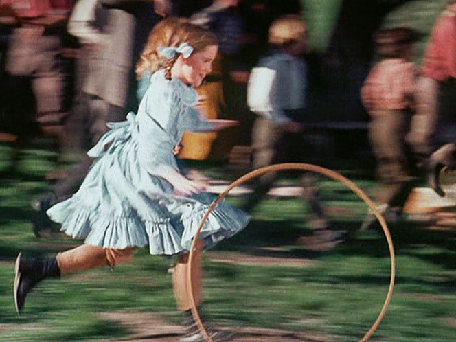 Laura competes in a hoop race