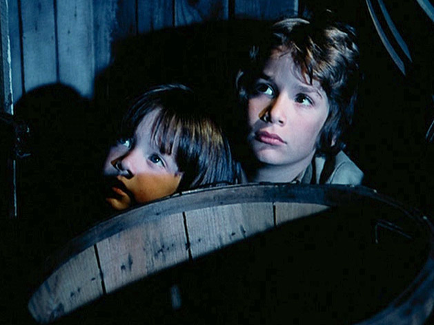 Orphan brothers Josh and Michael hiding in the dark