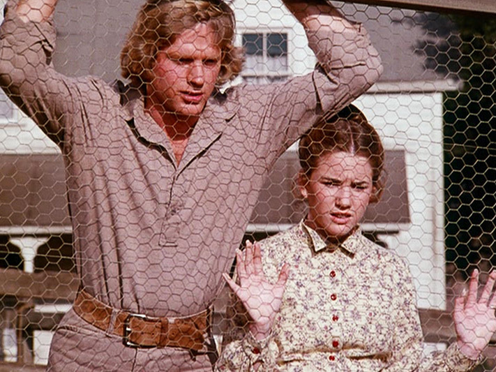 Almanzo and Laura survey their plucked chickens