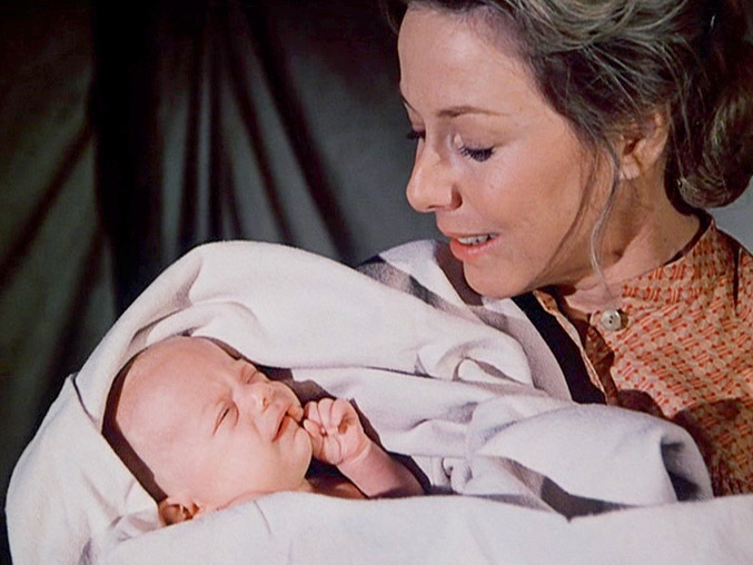 Caroline with Louisa's baby