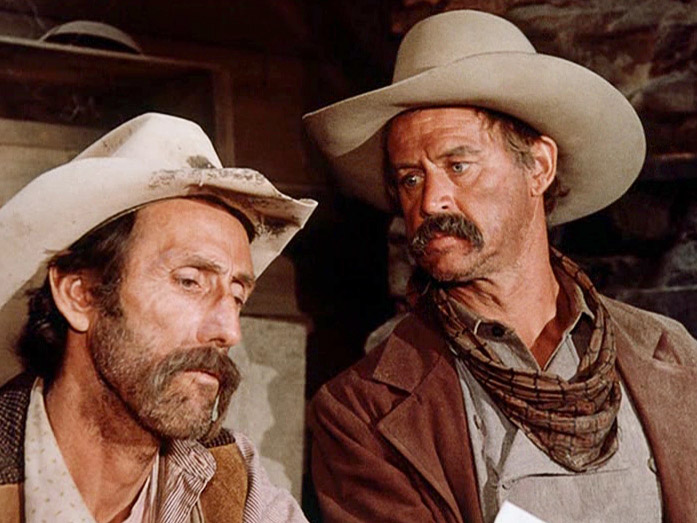 Bart Younger, played by Robert Donner, and Cole Younger, played by Geoffrey Lewis